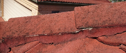 Close up view of the red roof with slight damage